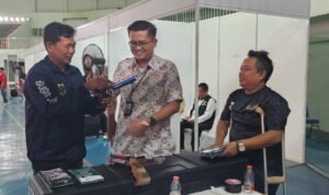 Sekdinsos Trian Turangga dan Perwakilan NPCI Sekdinsos Trian Turangga dan Perwakilan NPCI