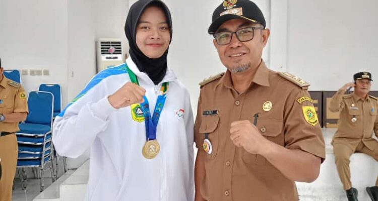 Asep Taryat Taryana dan Nur Aida