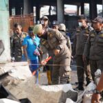 Satpol PP Kabupaten Bogor saat menertibkan PKL di Flayover Cileungsi, Foto/Satpol PP Kabupaten Bogor