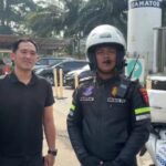 anggota Bripda Jonathan Naibaho bersama keluarga yang di kawal saat jalur one way di puncak Bogor, Foto/Satlantas Polres Bogor