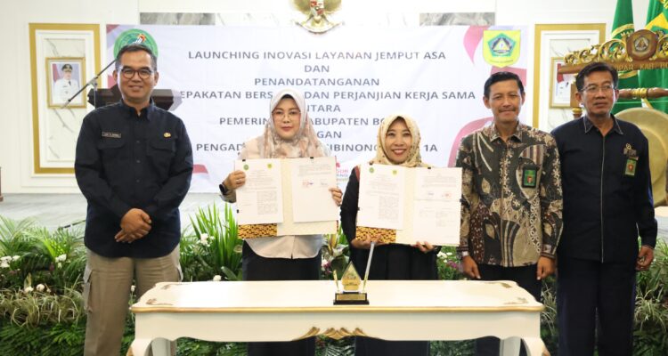 Sekda Kabupatenb Bogor, Ajat Rochman Jatnika bersama Pengadilan Negeri Agama Cibinong saat meresmikan layanan Jemput Asa, Foto/Diskominfo Kabupaten Bogor