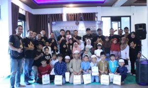 Foto bersama staf BRI Depok bersama anak yatim saat menggelar acara santunan, Foto/Istimewa