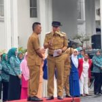 Lurah Tegal Gundil, Zaelani, untuk naik ke atas podium di hadapan ratusan aparatur sipil negara (ASN), Foto/Istimewa