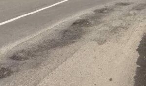 Kondisi Jalan berlobang di Kota Bogor, Foto/Adi Wirman Kondisi Jalan berlobang di Kota Bogor, Foto/Adi Wirman