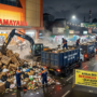 Gambar Ilustrasi pembersihan sampah saat malam Takbiran, Foto/Gemini Ai