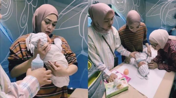 Mama Rieta saar menggendong bayi laki-laki diduga hasil adopsi Raffi-Nagita, Tangkapan layar youtube @ransEntertaint Mama Rieta saar menggendong bayi laki-laki diduga hasil adopsi Raffi-Nagita, Tangkapan layar youtube @ransEntertaint