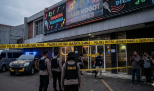 Gambar Ilustrasi Penggerebekan tempat karaoke di daan Mogot, Jakarta, Foto/Gemini AI